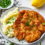 Wiener Schnitzel, served with mashed potatoes.
