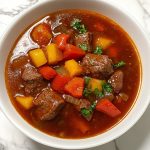 Authentic German Goulash, served in a soup.