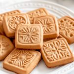 Traditional Spekulatius Cookies, on a white plate.