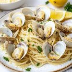 Spaghetti alle Vongole (Clam Spaghetti), served on a white plate.