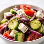 Greek Salad (Horiatiki) In a bowl.