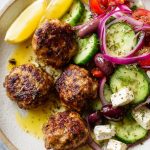 Greek Fried Meatballs, served with a greek salad.