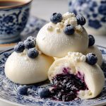 Czech fruit dumplings, on a plate. Ovocné Knedlíky