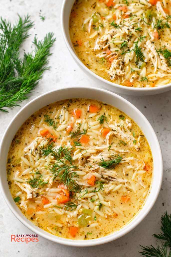 Avgolemono (Greek Lemon Chicken Soup), served in bowls.