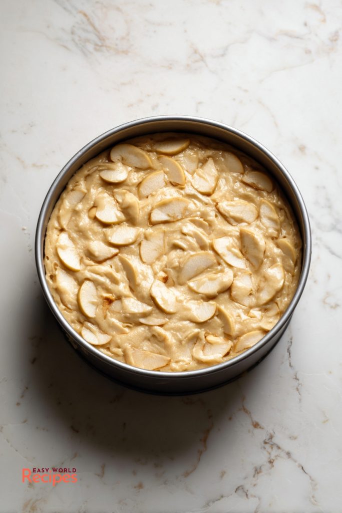 Unbaked Greek Milopita in a baking dish.